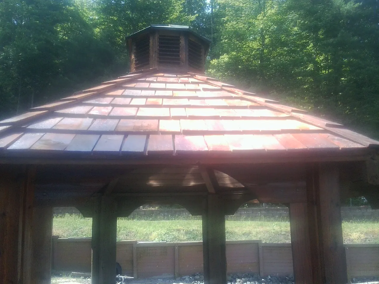 New cedar shake roof and cupola on a lakeside gazebo in Playa Del Rey